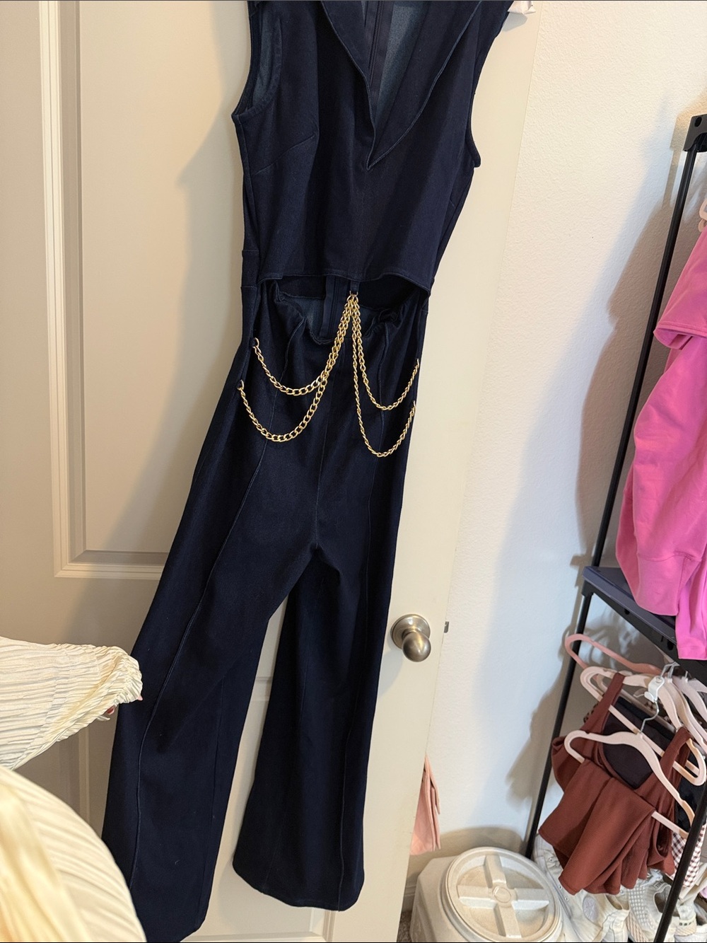 Sleeveless Navy Jumpsuit with Gold Chain Detail